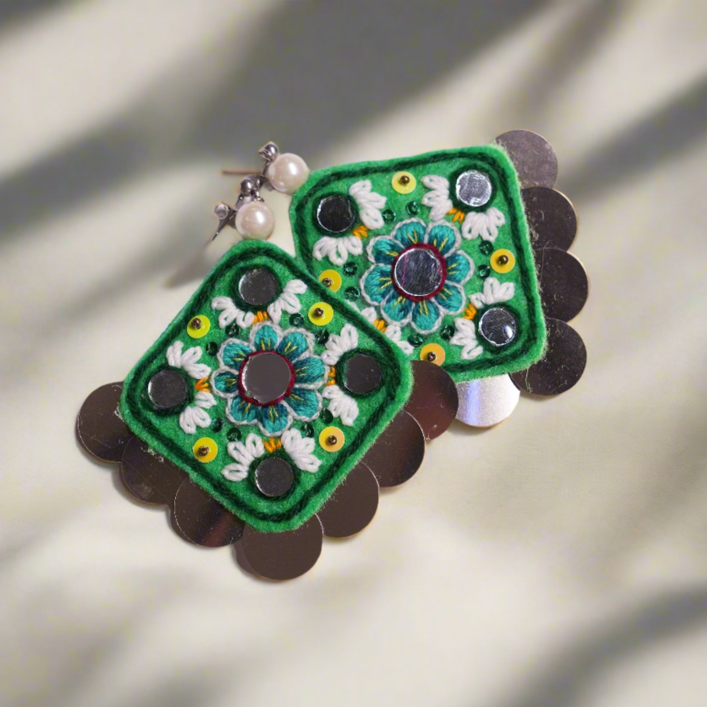 Handcrafted Blossom Earrings with intricate Persian-inspired floral design, symbolizing resilience and growth, made by skilled artisans over 2-8 days