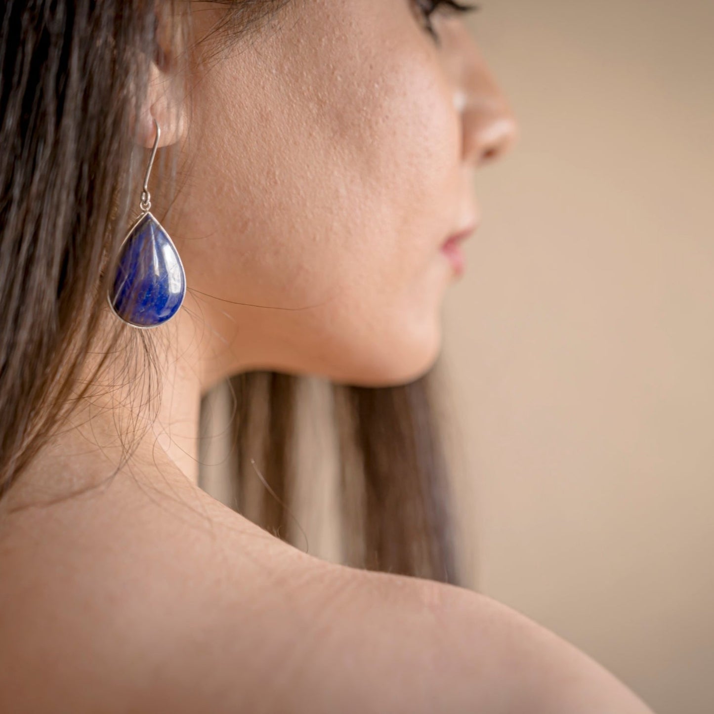 Handcrafted Malileh Earrings with 999 silver and lapis lazuli stones, bringing Persian-inspired elegance to your jewelry collection
