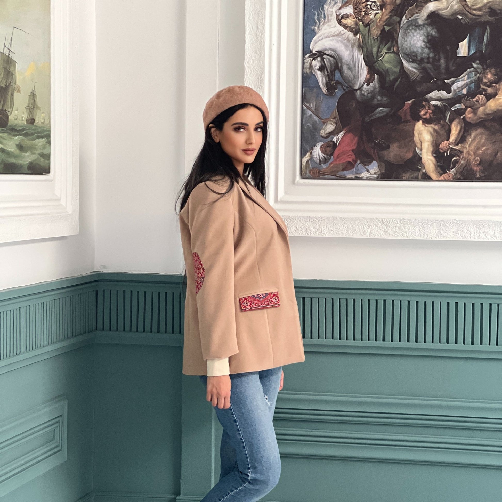 Artisan-crafted Harmony Coat in high-quality felt, featuring a unique hand-stitched panel for a cozy and stylish winter look.