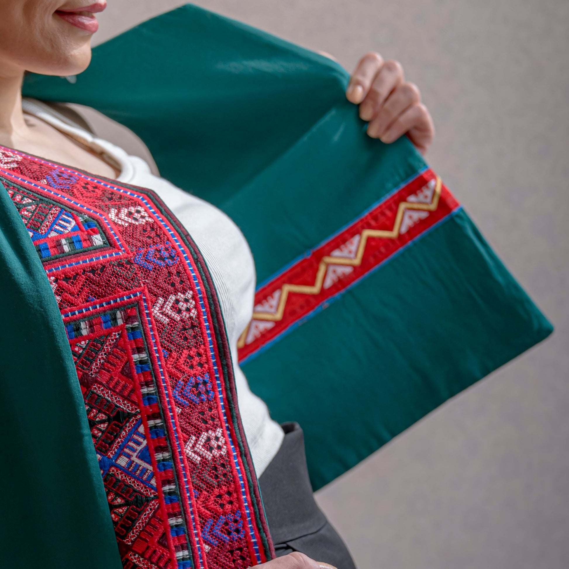 Detailed shot of the Baluchi Linen Vest showing Persian artistry in a reversible linen design, made for a unique cultural fashion statement