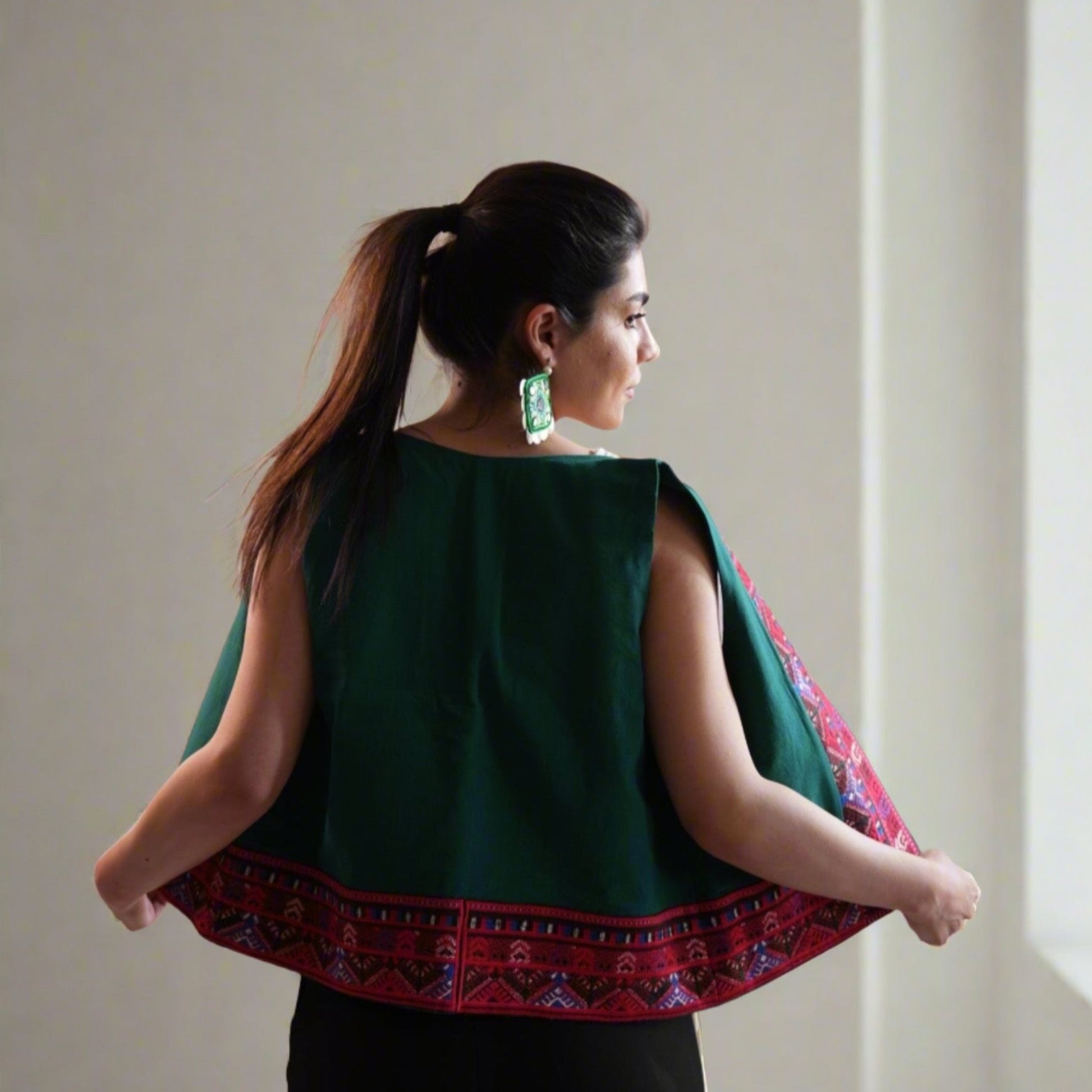 Back view of the handmade Baluchi Linen Vest, a one-of-a-kind Persian piece with reversible styling and fine linen for size 38-40