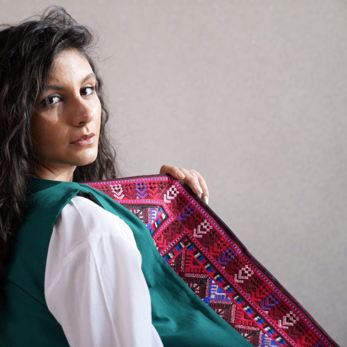 Detailed close-up of the Baluchi Linen Vest, showing intricate Persian artistry and fine linen texture