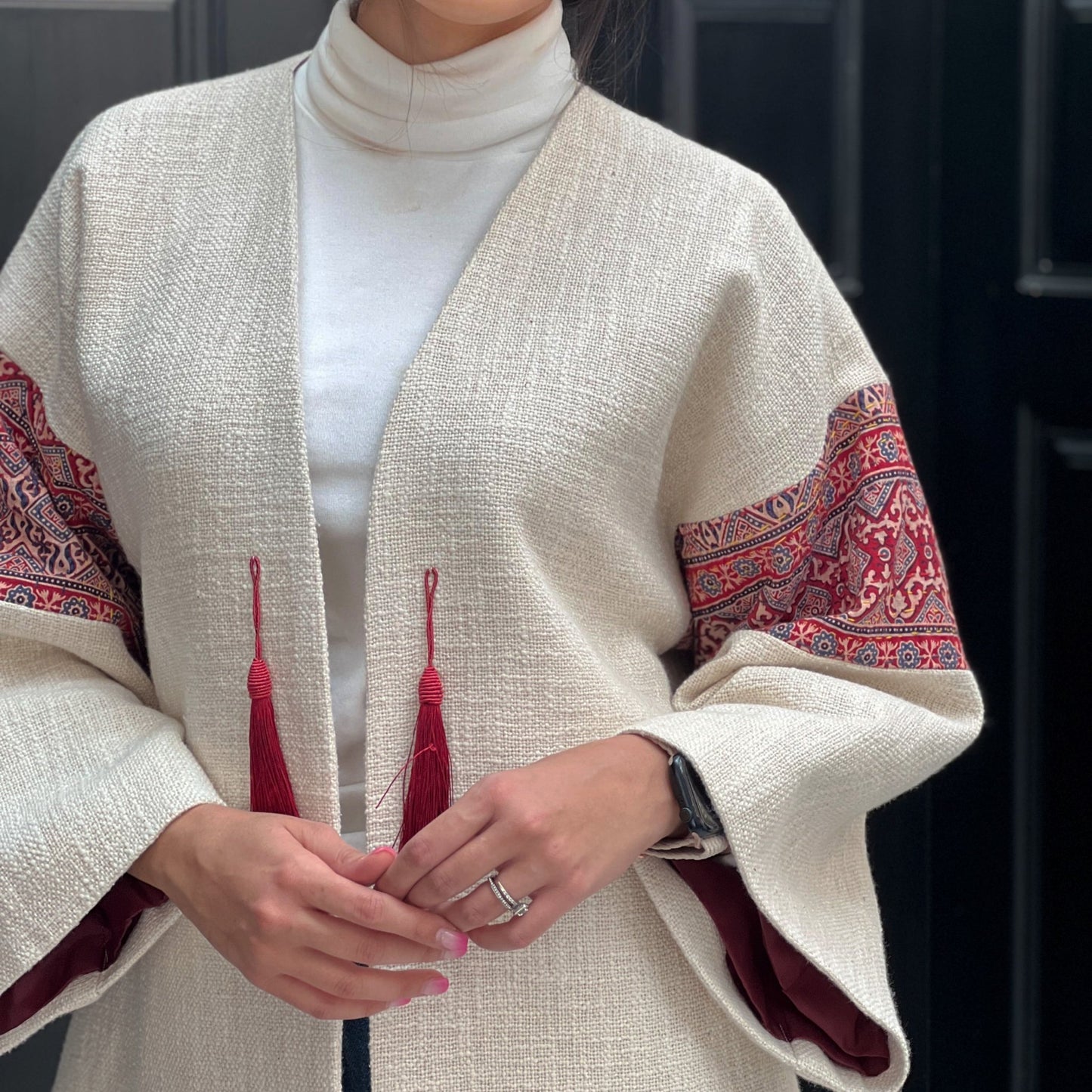  close-up of  Fusion Jacket, featuring high-quality felt and Termeh panels for a luxurious look