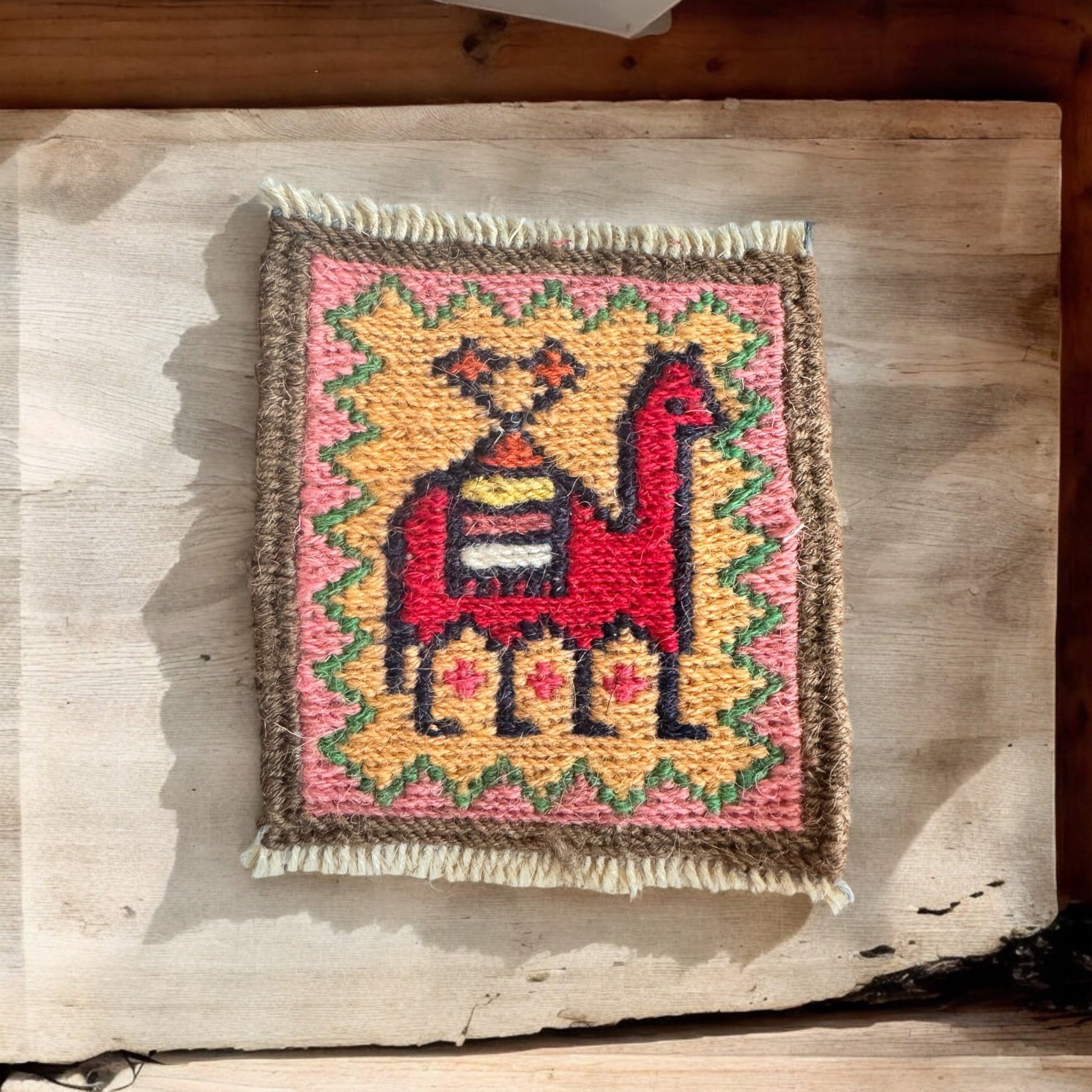 Colorful Gelim coasters crafted with Persian weaving techniques, customizable in various colors and patterns for unique decor