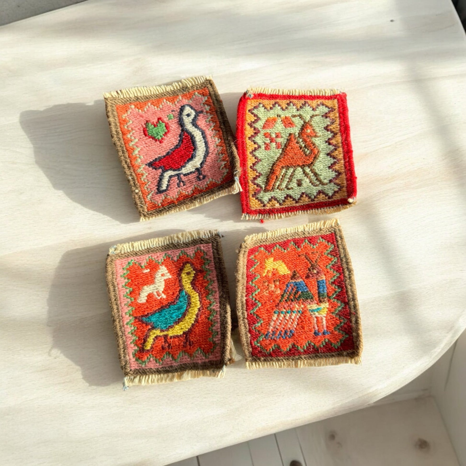 Handcrafted Persian Gelim coasters with vibrant patterns, ideal for both modern and traditional decor settings