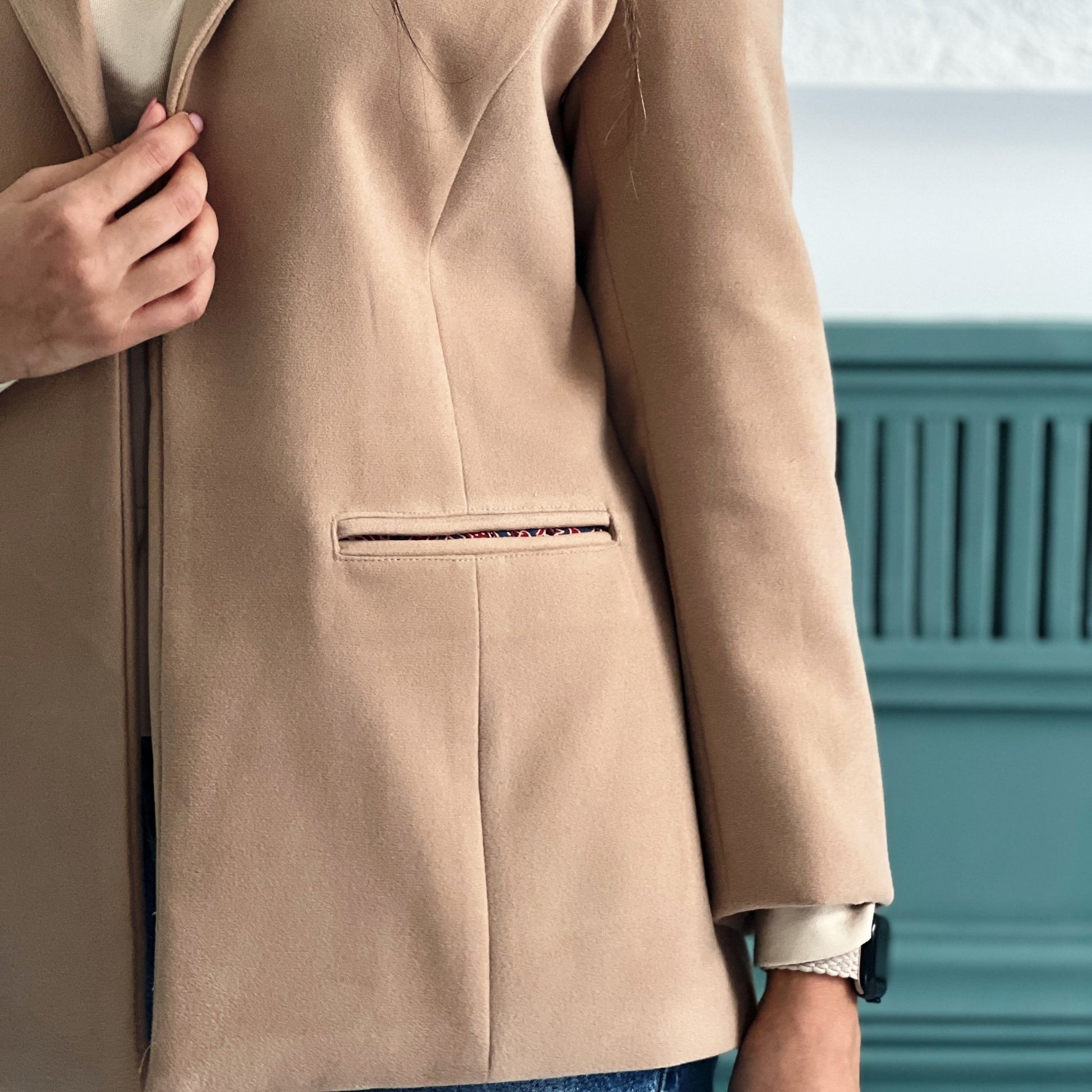 Handcrafted Harmony Coat made from premium felt with unique hand-stitched details, perfect for elegant winter warmth