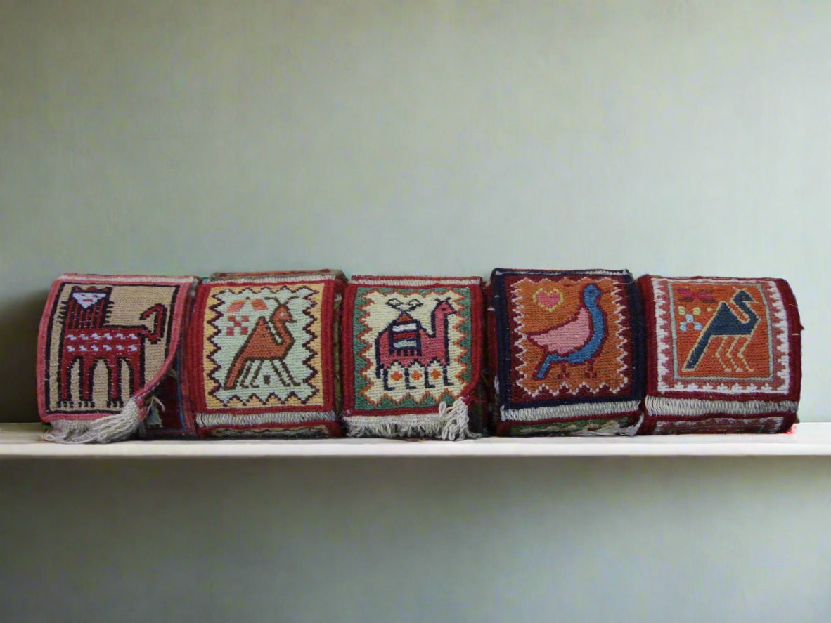 Handcrafted Gelim coasters with traditional weaving, ideal for coffee shops and home decor, providing surface protection