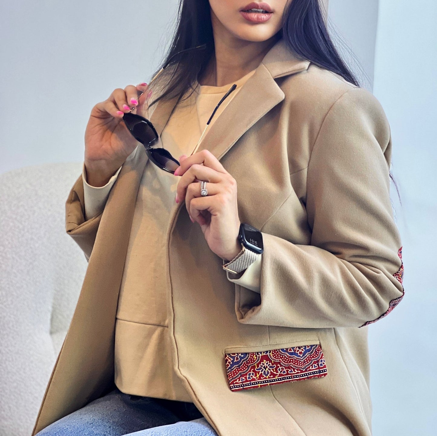 Harmony Coat crafted from premium felt with hand-stitched detailing, providing warmth and artisanal style for winter