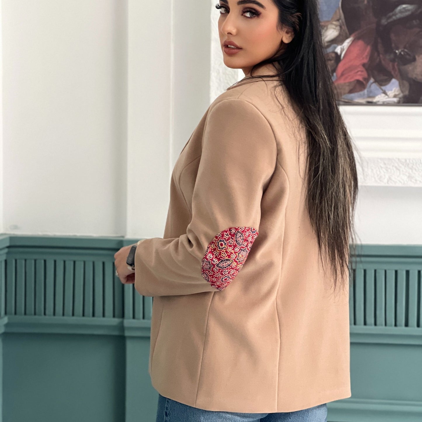 Harmony Coat featuring artisanal hand-stitched detailing on premium felt, offering a cozy and stylish look for colder seasons