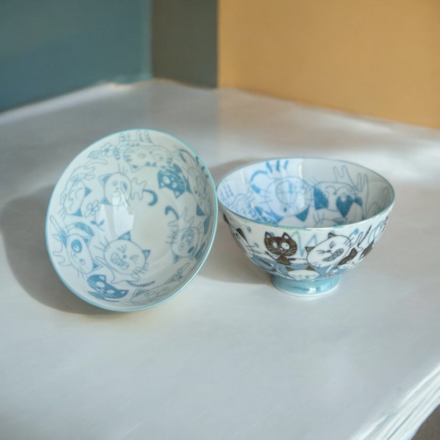 Japanese ceramic cat bowl with cute design, microwave and dishwasher safe, ideal for ramen, cereal, and snacks