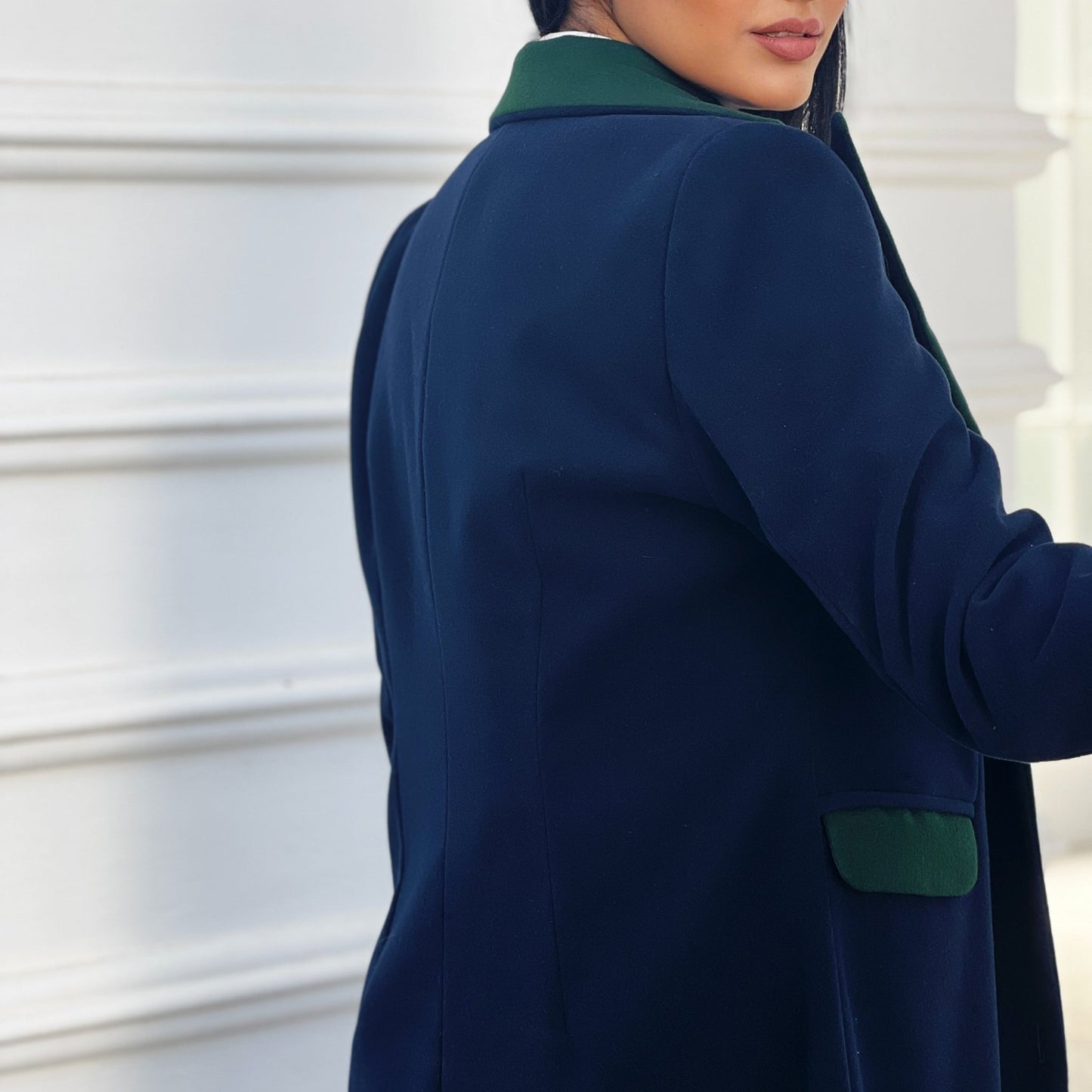 Navy and green Nexus Coat with a long, tailored fit, suitable for casual and formal layering