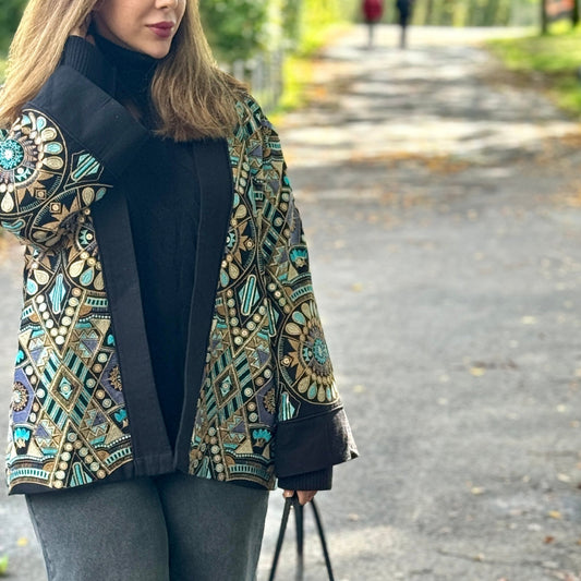 Ocean Jacket in vibrant turquoise with intricate Luxloirs embroidery, made from ethically sourced fabric