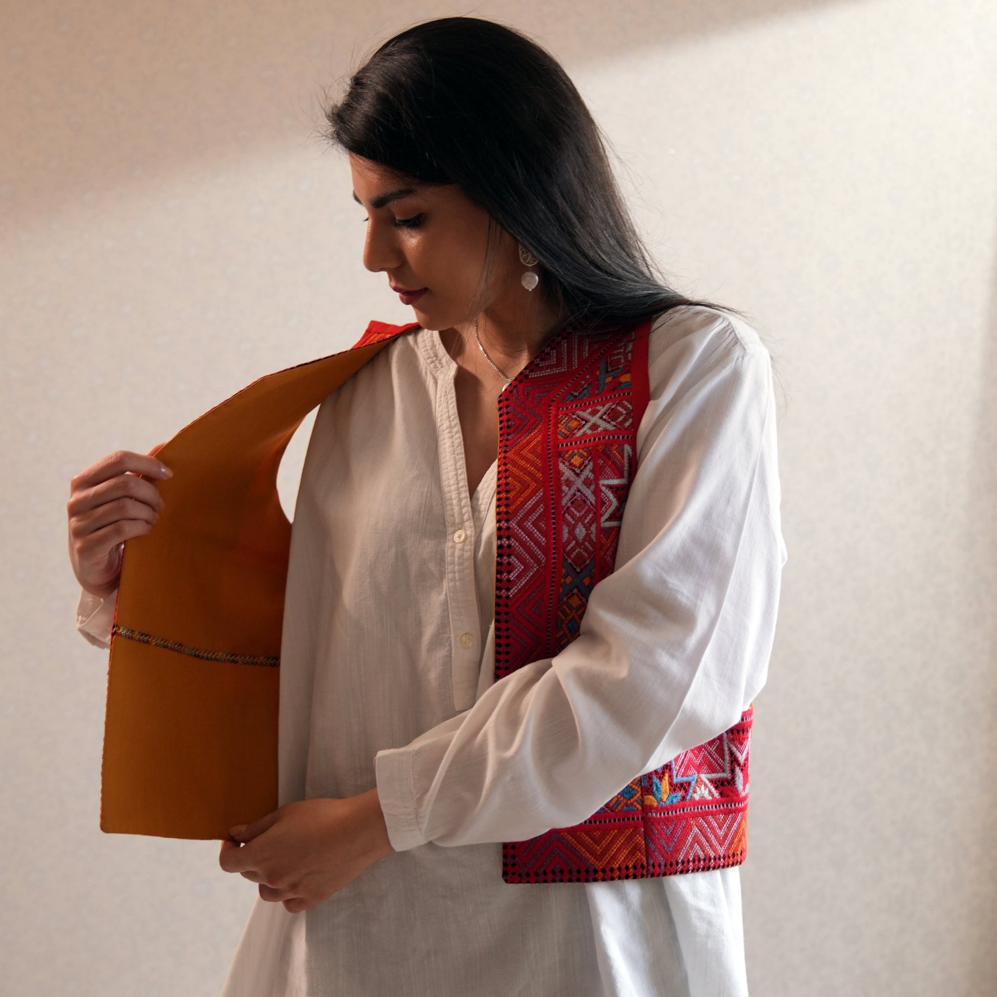 Front view of Baluchi Linen Vest with traditional Baluchi needlework, crafted from ethically sourced linen, reversible in size 38-40